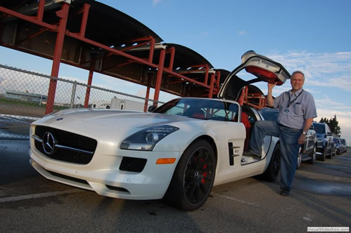 The author poses with the awesome gullwing SLS AMG