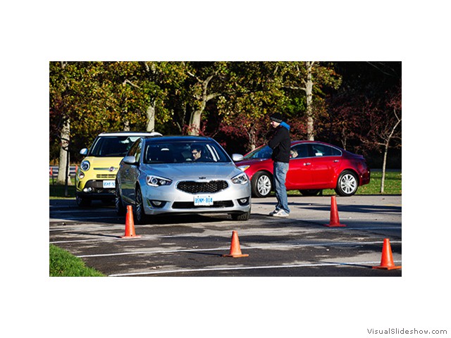 Journalists wait in line to drive through the handling course as they take part in "real-world" back-to-back testing during the 2014 Canadian Car of the Year Awards "TestFest" event on Monday, October 21, 2013 in Niagara Falls, Ontario. Automotive journalists from across the country evaluate and vote on vehicles to provide results which are relevant to potential car and truck buyers. (Michelle Siu for AJAC)
