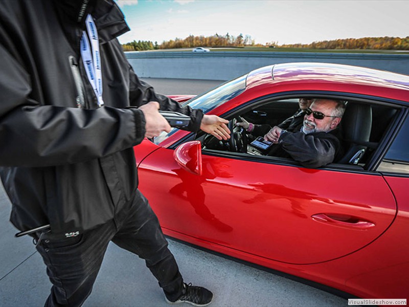 Some oaf getting ready to take the 911 onto the track. 