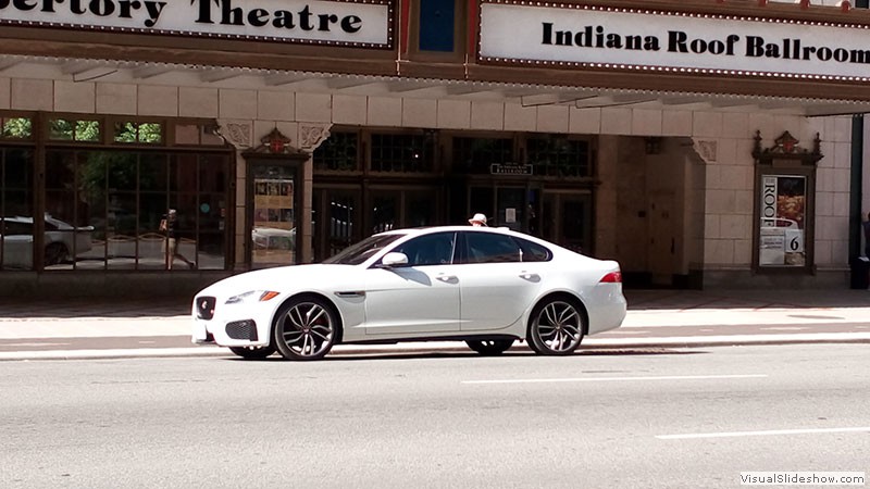 Jaguar XF S in downtown Indianapolis with a disembodied head floating on it - photo by the author