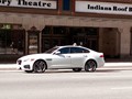 Jaguar XF S in downtown Indianapolis with a disembodied head floating on it - photo by the author